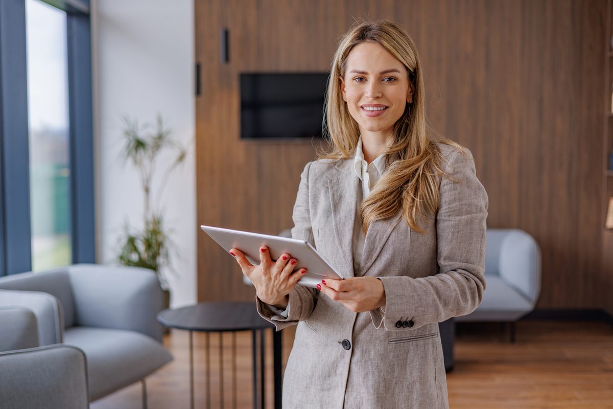 Real estate agent with tablet